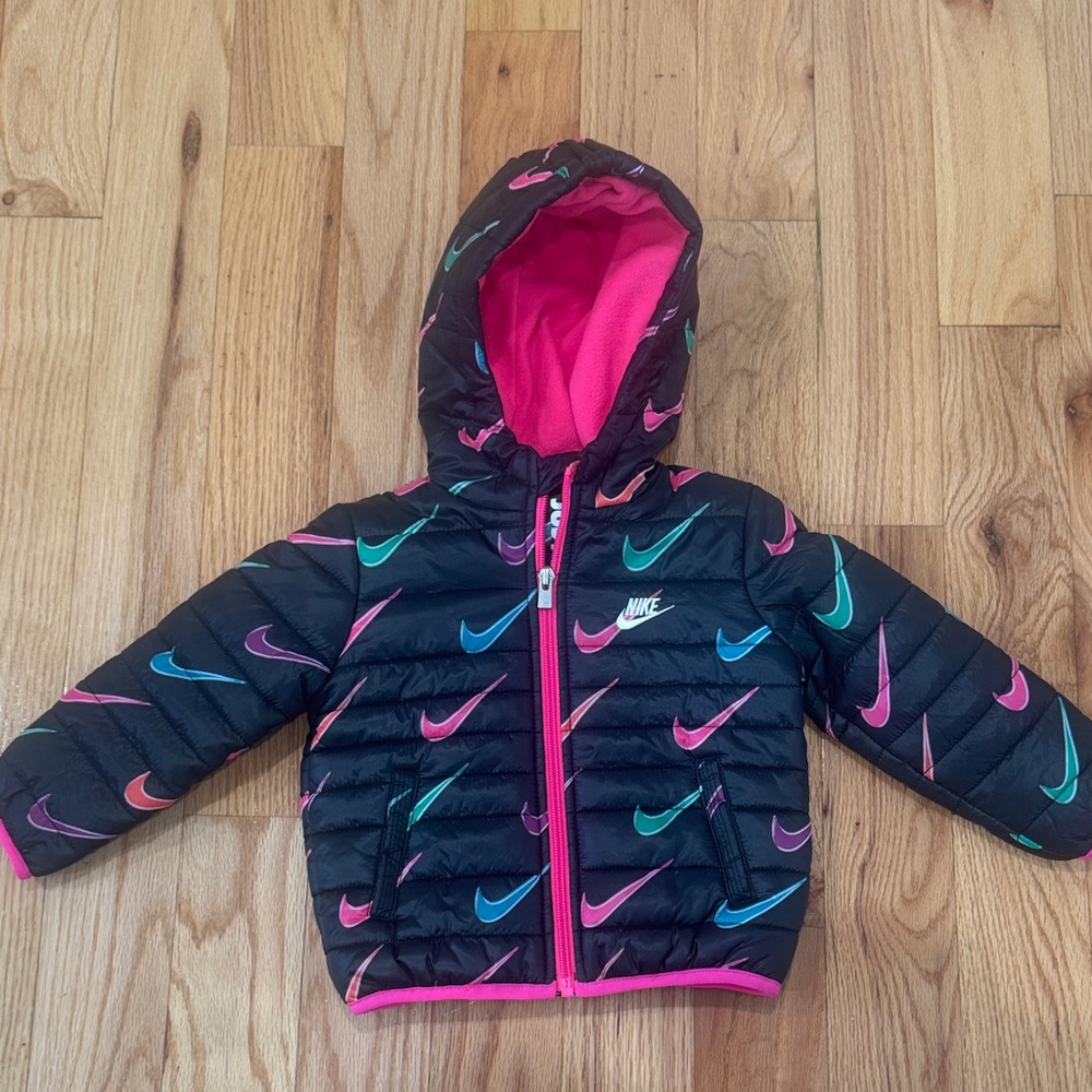 Nike Kids' Black Puffer Jacket with Pink and Blue Accents
